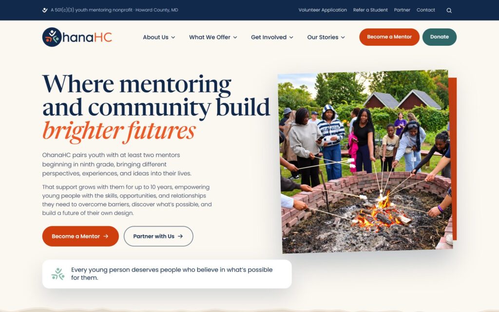 The new OhanaHC homepage, headed Where mentoring and community build brighter futures, with Become a Mentor and Partner with Us buttons beside a photo of students around a fire pit